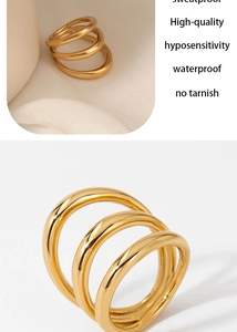 Macro detail of gold-plated triple-layer spiral ring on elegant beige satin background