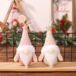 Pink and beige knitted Christmas gnomes with long plush beards for festive tree decoration