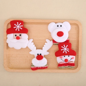 Christmas LED brooches featuring cartoon Santa, bear, reindeer and snowman plush designs