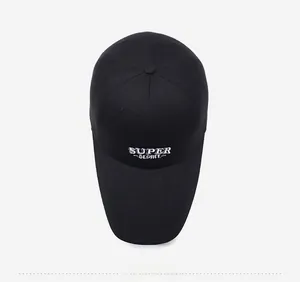 Top down macro view of a black baseball cap featuring white SUPER DEGREE embroidery