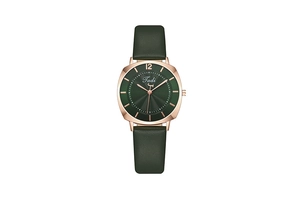 Detail of square dark green watch face with ripple texture and rose gold hands
