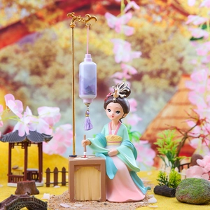 Macro view of ancient Chinese style miniature girl figurine writing at a desk with lantern