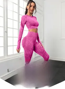 Detail of magenta seamless yoga set featuring cut-out breathable knit and marble texture