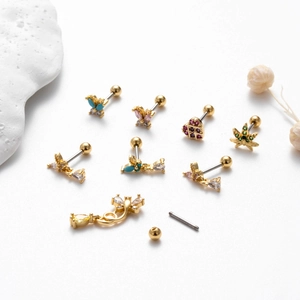8-piece gold stainless steel piercing set with colorful zircons and butterfly heart charms