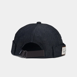 Retro dark blue denim miki hat with adjustable leather strap and lettered labels