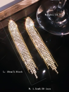 Detail showing 10cm long tassel earrings with dimensions and weight specs