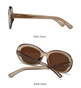 Detail view showing metal hinges and side profile of tea brown oval vintage sunglasses