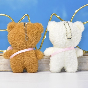 Adorable 12cm plush teddy bear keychains in brown and white colors for bags and keys.