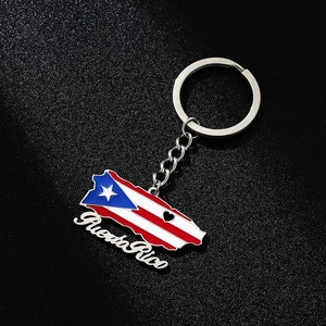 Detailed macro view of Puerto Rico flag pendant keychain with vibrant enamel finish