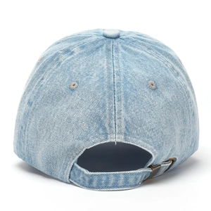 Detail view of denim baseball cap with adjustable metal buckle and six-panel stitching