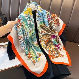 Vintage tropical print silk scarf with floral palm patterns and orange border accents