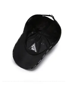 Close-up of black cotton baseball cap interior featuring EDNOTE logo and adjustable buckle