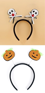 Detail of Halloween headbands featuring glitter pumpkins and skulls with spring design