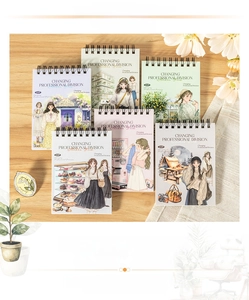 Macro view of spiral-bound planner stickers with professional vintage character designs