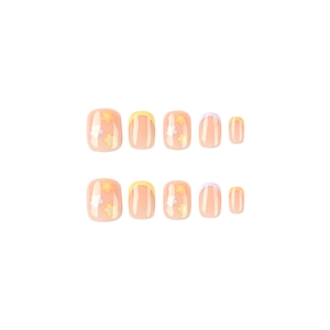 Faux ongles courts carrés avec pointes French jaunes et violettes et motifs marguerites