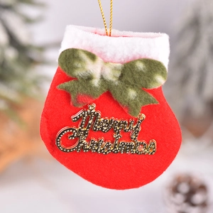 Red felt Christmas stocking ornament with gold Merry Christmas lettering and green bow