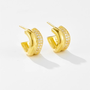Retro curved S925 silver stud earrings with gold finish and sparkling crystal pavé