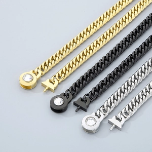 Polished curb chain necklaces in gold, black, and silver with rhinestone toggle clasps