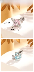 Dettaglio orecchini a pianeta rosa e blu con zirconi e chiusura a vite, lunghezza 1,2 cm