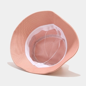 Inside view of coral cotton bucket hat featuring adjustable wind rope and sweatband