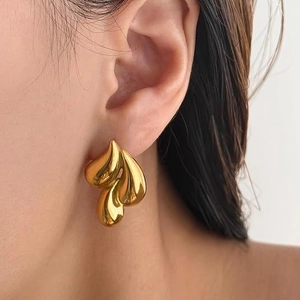 Minimalist gold droplet stud earrings with a liquid metal effect for women
