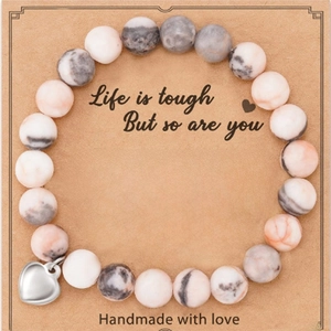 8mm Pink Zebra stone beaded bracelet with silver heart pendant on inspirational card