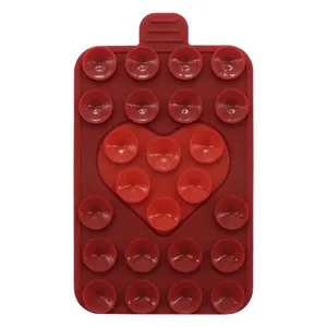 Close-up of dark red heart-shaped silicone suction cup holder with 24 mini grippers