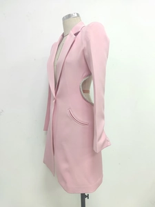 Detailed view of pink blazer dress featuring side cutout with sparkling rhinestone trim