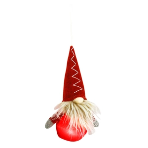 Gnomo natalizio appeso con luce LED e cappello di peluche rosso su sfondo bianco