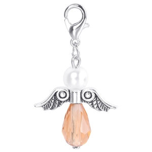 Macro shot of an amber crystal teardrop angel pendant with silver wings and clasp