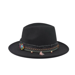 Black wool felt fedora hat featuring a bohemian woven band with tassels and turquoise