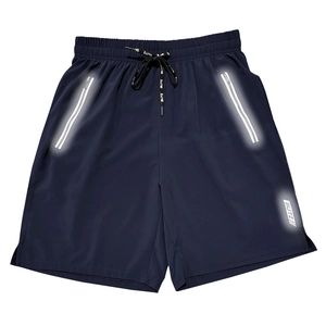 Detail of navy sport shorts with reflective zipper pockets and drawstring waist
