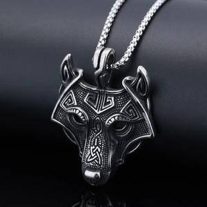 Detailed view of punk wolf head pendant with vintage Nordic Viking texture on black base