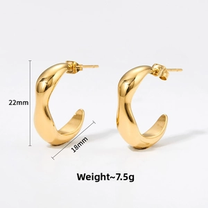 Detailed view of gold C-hoop earrings with wavy texture, size 22mm x 18mm, weight 7.5g
