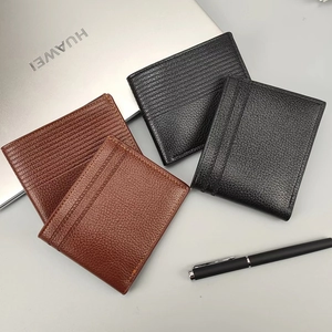 Détails de portefeuilles en cuir pour hommes avec grain litchi et texture embossée