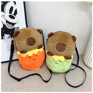 Detail of plush capybara bag showing soft texture, zipper, and brown shoulder strap