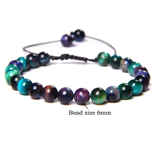 Detail showing 6mm multicolored tiger eye beads on an adjustable braided bracelet cord