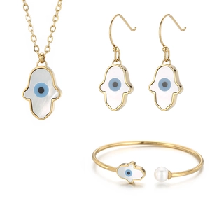 Golden Evil Eye jewelry set with necklace, drop earrings and pearl open bangle