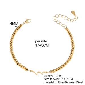 Detailed view of stainless steel wave pendant bracelet with 4mm gold beads and measurements