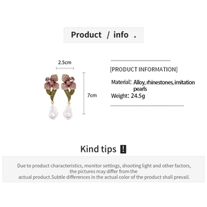 Detail of flower earrings with pink rhinestones and baroque pearl drop, 7cm length