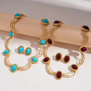 Parure de bijoux rétro avec pierres ovales, collier doré et boucles d'oreilles vintage