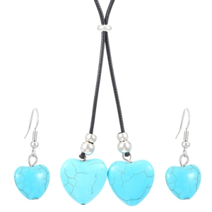 Vintage turquoise jewelry set featuring heart-shaped necklace and circular earrings for women