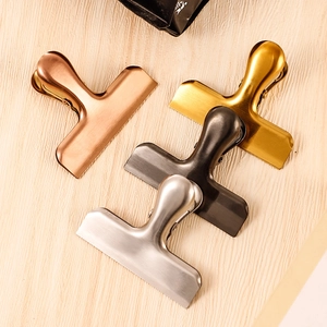 Versatile T-shape stainless steel food clips in rose gold, gold, black and silver finishes