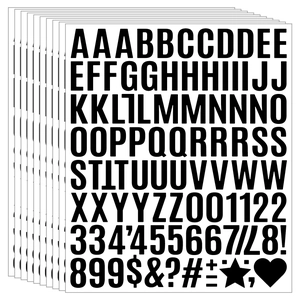 Close-up of stacked black vinyl alphabet and number stickers for DIY craft labeling
