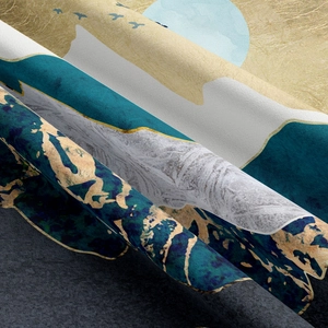 Close-up detail of mountains and sun print showing high-quality woven fabric texture