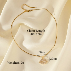 Gold-plated hollow lip pendant necklace with zircon rhinestones on white silk