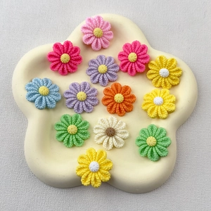 Mix of colorful resin flower charms for DIY phone cases and craft decorations