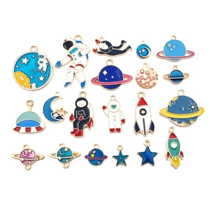 Detail of 17 pieces space theme enamel pendants including astronaut and planets