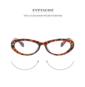 Close-up of leopard tortoiseshell cat-eye glasses frames with detailed star-fan pattern
