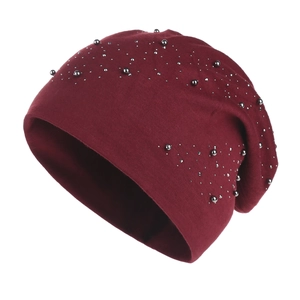 Women's burgundy knitted beanie with silver rhinestone and bead embellishments